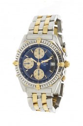 A Stainless Steel and 18 Karat
