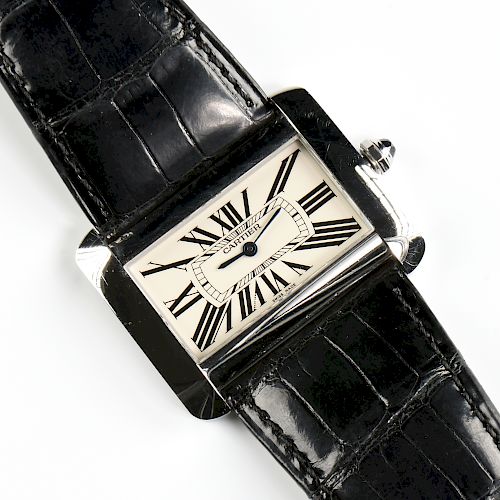 A STAINLESS STEEL CARTIER DIVAN