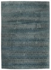 A STARK "KESHA PLUTO" AREA RUG