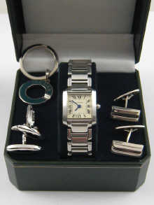 A steel lady's wrist watch together