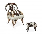 A STEER HORN AND COWHIDE CHAIR
