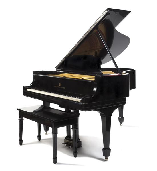 A Steinway & Sons Baby Grand