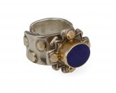 A STERLING SILVER AND GOLD LAP