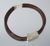 A Sterling Silver and Leather