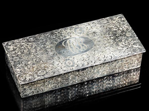 A STERLING SILVER BOX AND