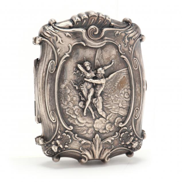A STERLING SILVER CARD CASE BY