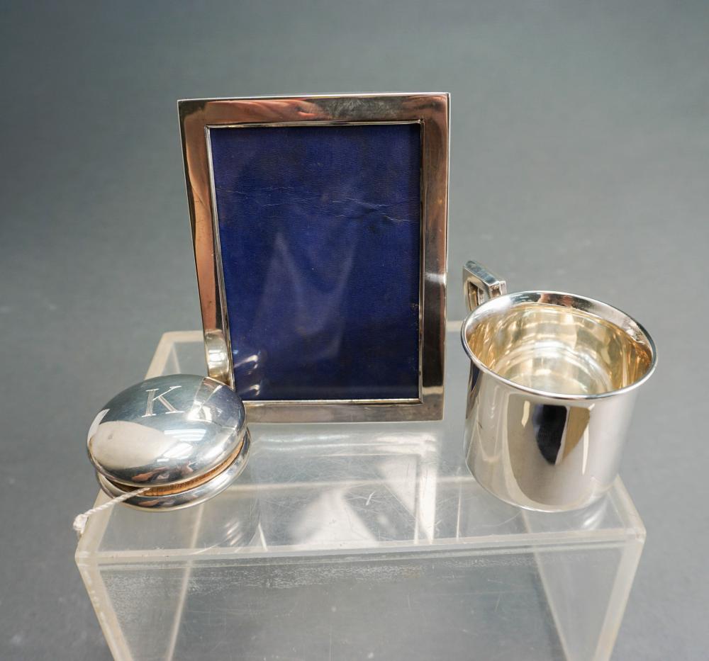 A STERLING SILVER CLAD YO-YO,