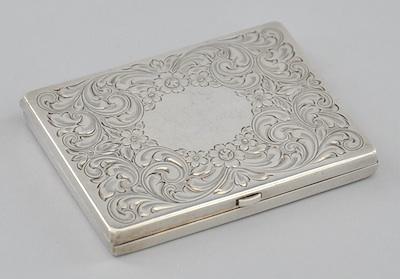 A Sterling Silver Compact With an