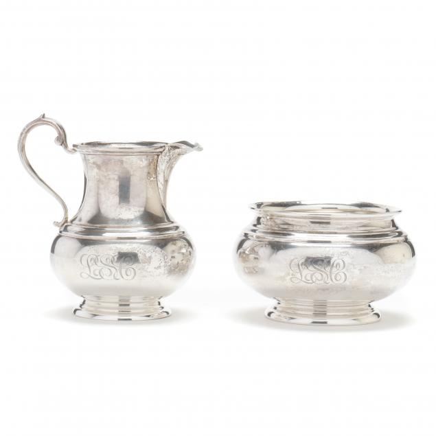 A STERLING SILVER CREAMER AND SUGAR