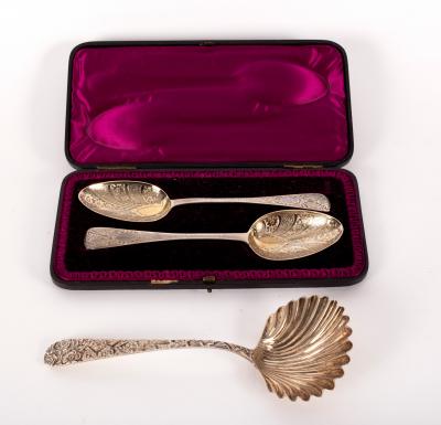 A sterling silver fruit spoon,
