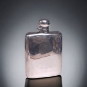 A STERLING SILVER HIP FLASK.RE