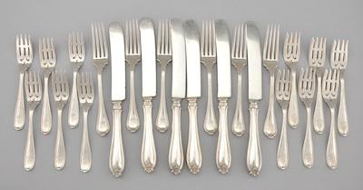 A Sterling Silver Lunch Service for