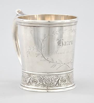 A Sterling Silver Mug Mug has a