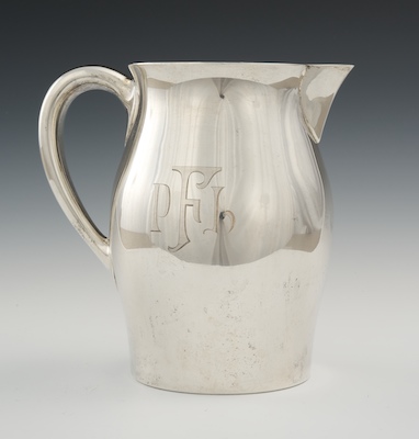 A Sterling Silver Pitcher by Reed &