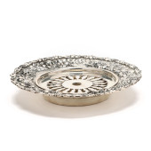 A STERLING SILVER REPOUSSE BUT