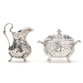 A STERLING SILVER REPOUSSE CRE