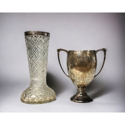 A sterling silver twin handle