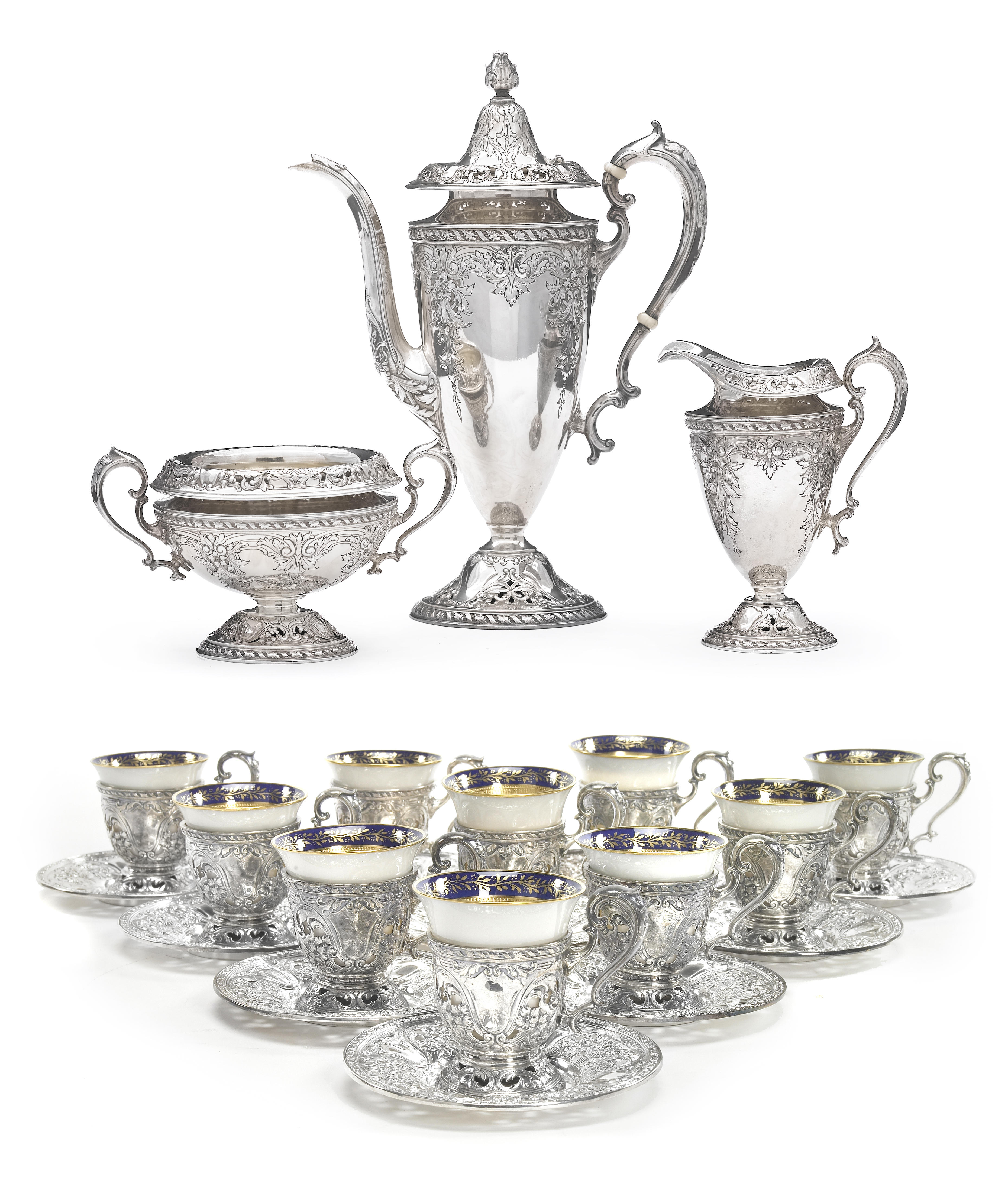A sterling three piece demitasse