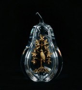 A STEUBEN 18K GOLD AND GLASS S