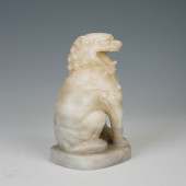 A STONE - CARVED SQUATTING LIO