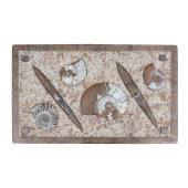 A STONE TABLE TOP WITH FOSSILI