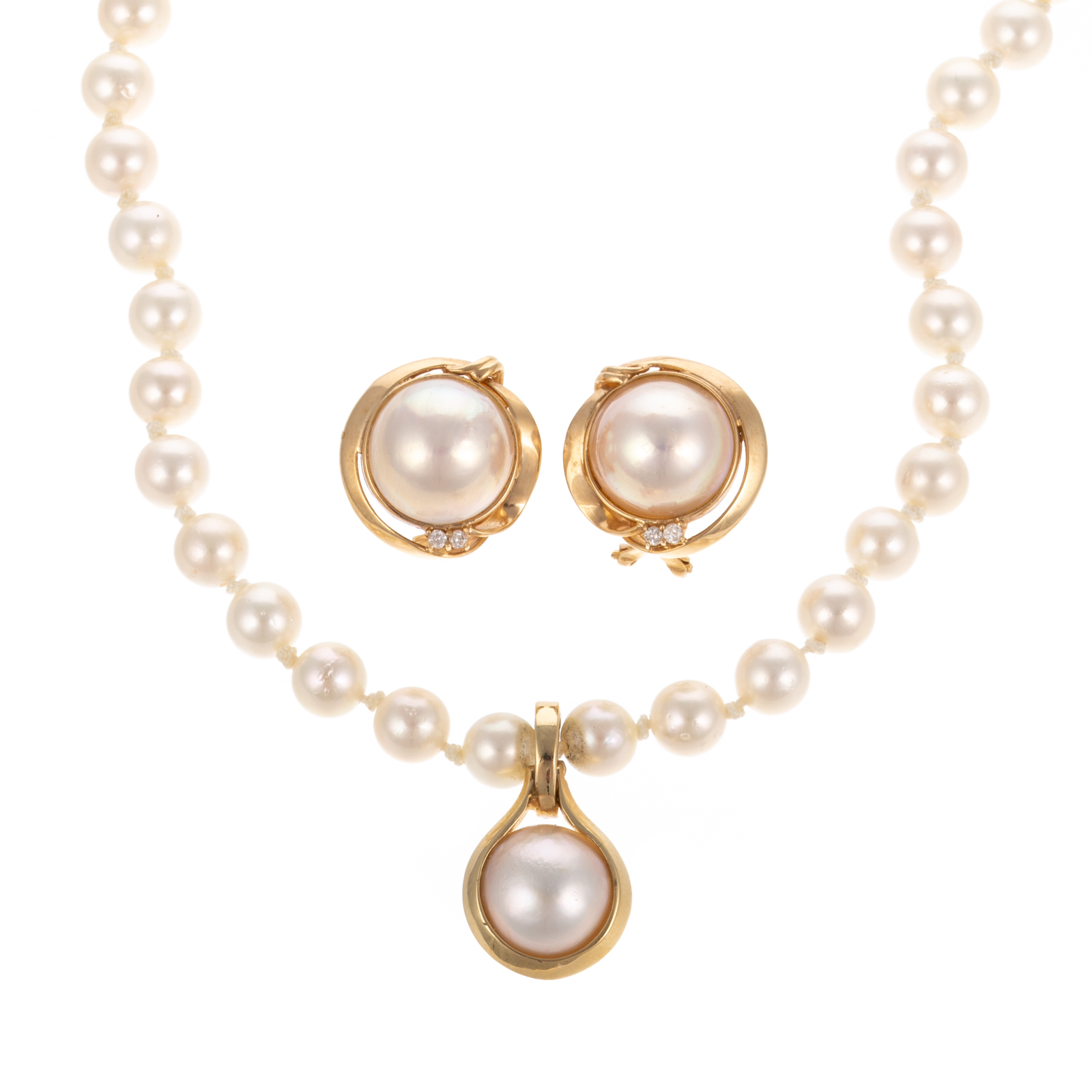 A STRAND OF PEARLS & MABE