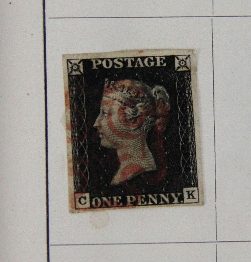 A Strand stamp album containing a