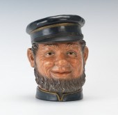 A Stylized Tobacco Jar Head of