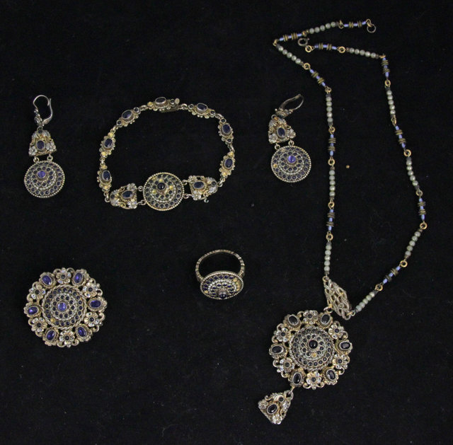 A suite of blue stone and faux