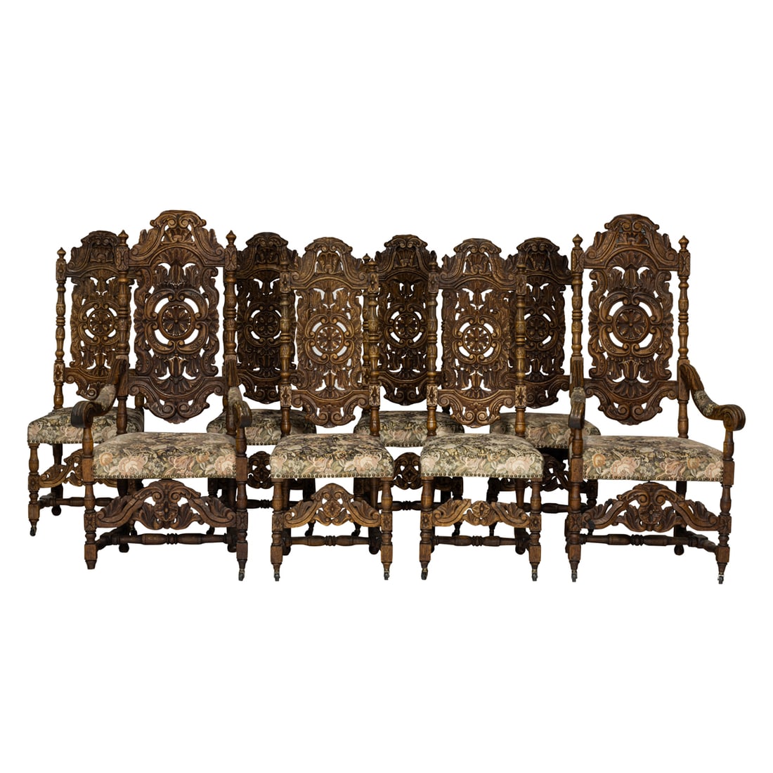 A SUITE OF EIGHT HAND CARVED