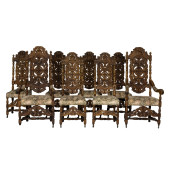 A SUITE OF EIGHT HAND CARVED E