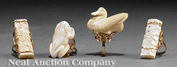 A Suite of Four Japanese Carved