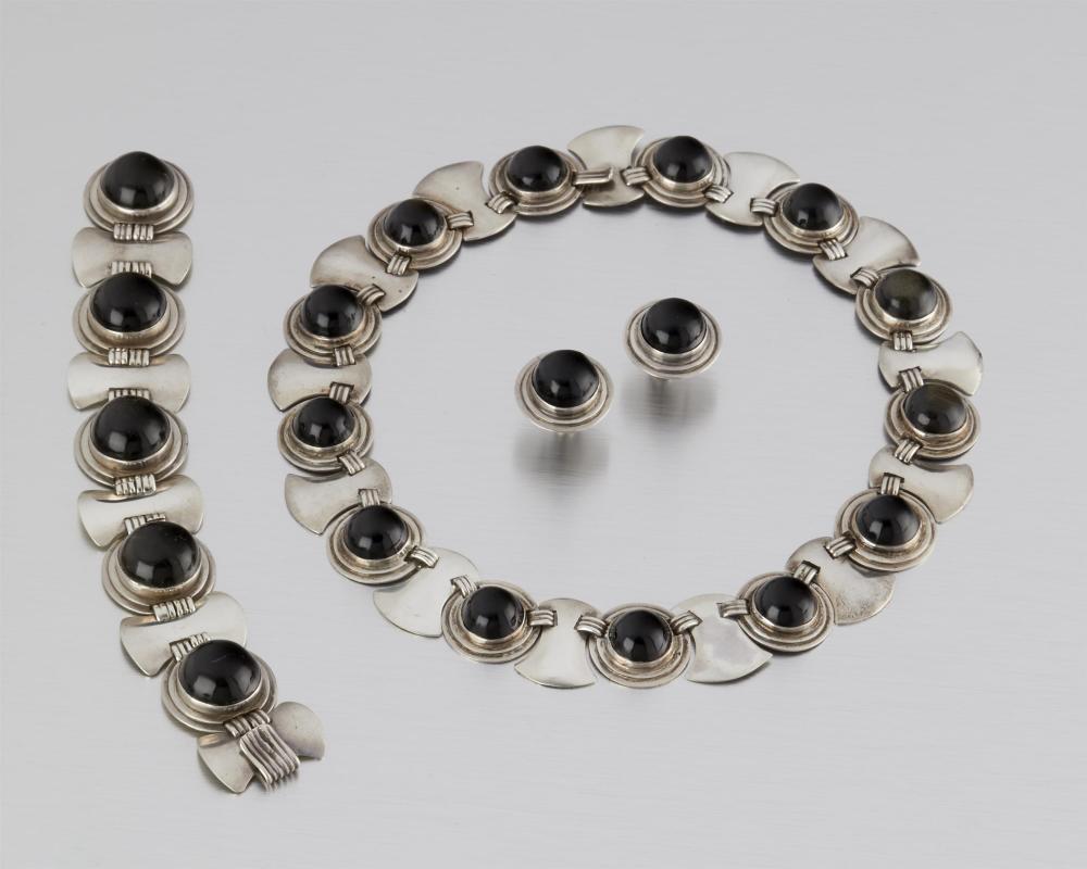 A SUITE OF FRED DAVIS SILVER AND