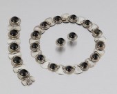 A SUITE OF FRED DAVIS SILVER A