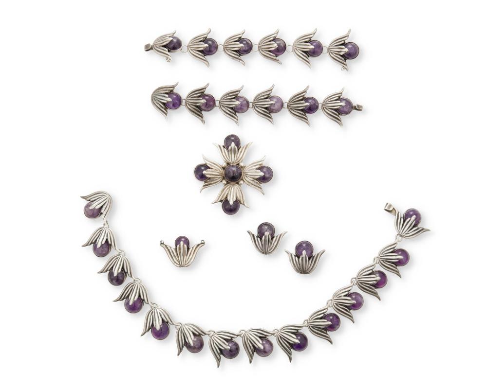 A SUITE OF HUBERT HARMON SILVER AND