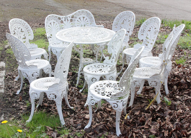 A suite of white painted garden