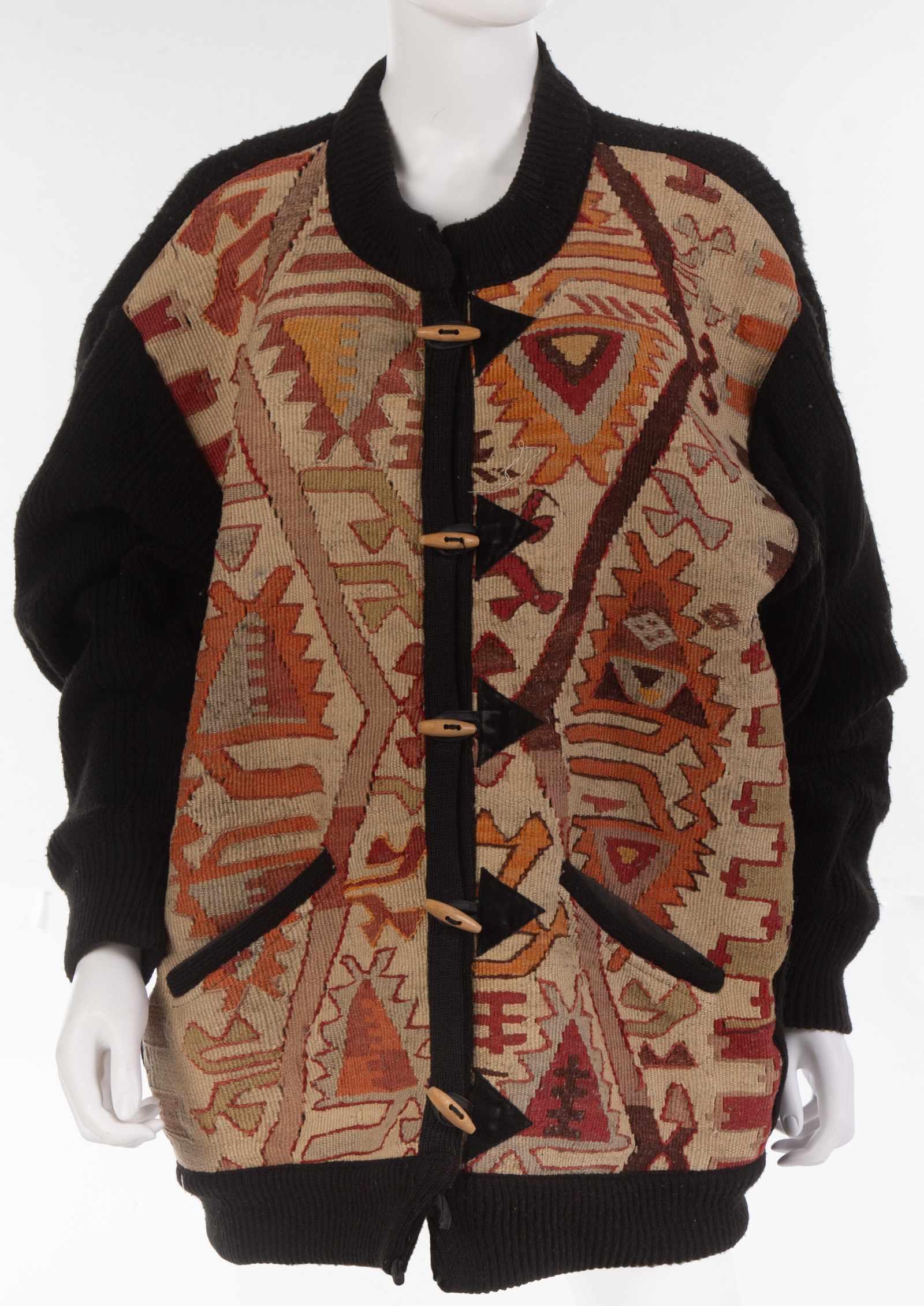 A SWEATER COAT WITH TOGGLE