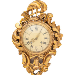 A Swedish Giltwood Cartel Clock