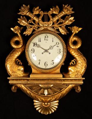 A Swedish style gilt framed wall