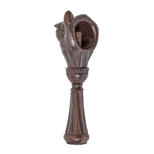 A Swiss carved and stained limewood