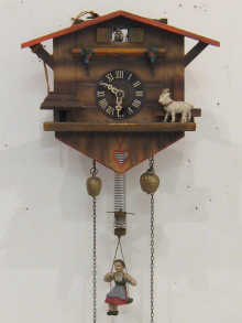 A Swiss cuckoo clock with girl on