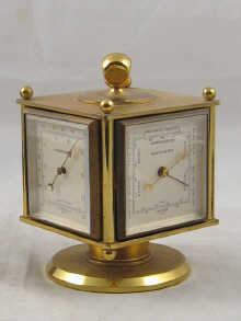 A Swiss four faced gilt brass
