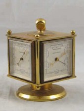 A Swiss four faced gilt brass