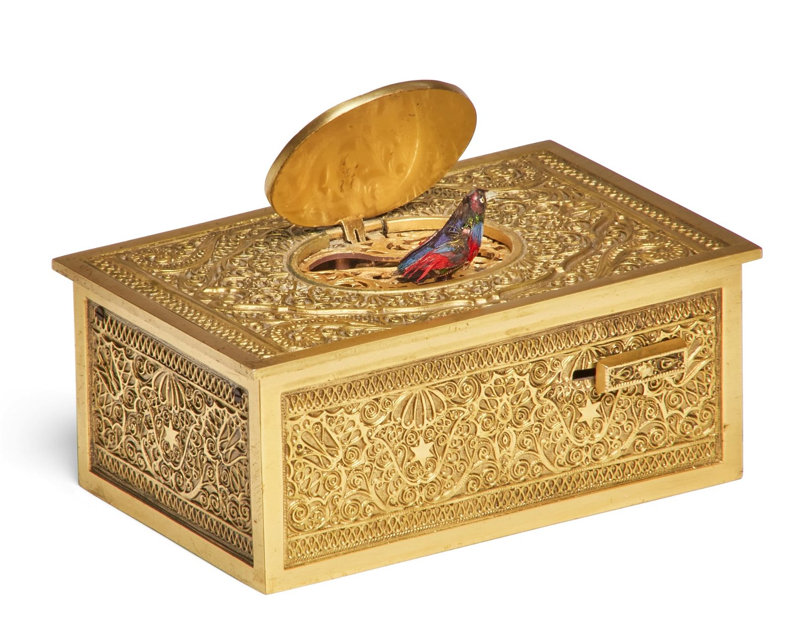 A SWISS GILT METAL SINGING BIRD