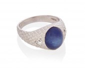 A SYNTHETIC STAR SAPPHIRE AND