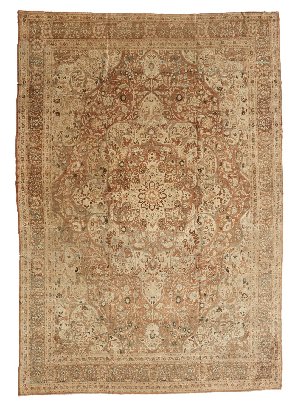 A TABRIZ AREA RUGA Tabriz area rug,