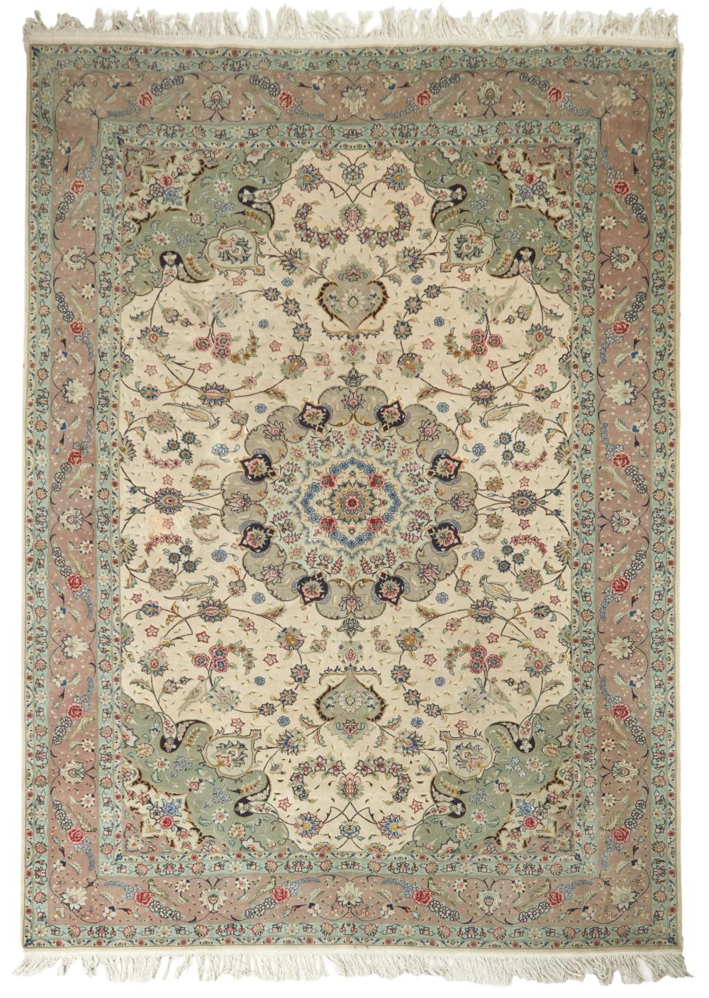 A TABRIZ AREA RUGA Tabriz area rug,