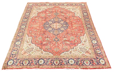 A Tabriz Carpet Central medallion