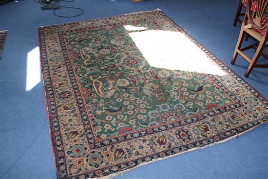 A Tabriz rug with field of