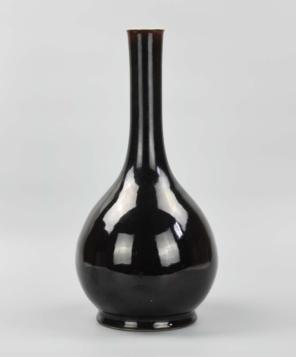 A TALL CHINESE BLACK GLAZED